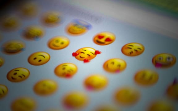 A bunch of emojis shown in a chat on a phone.
