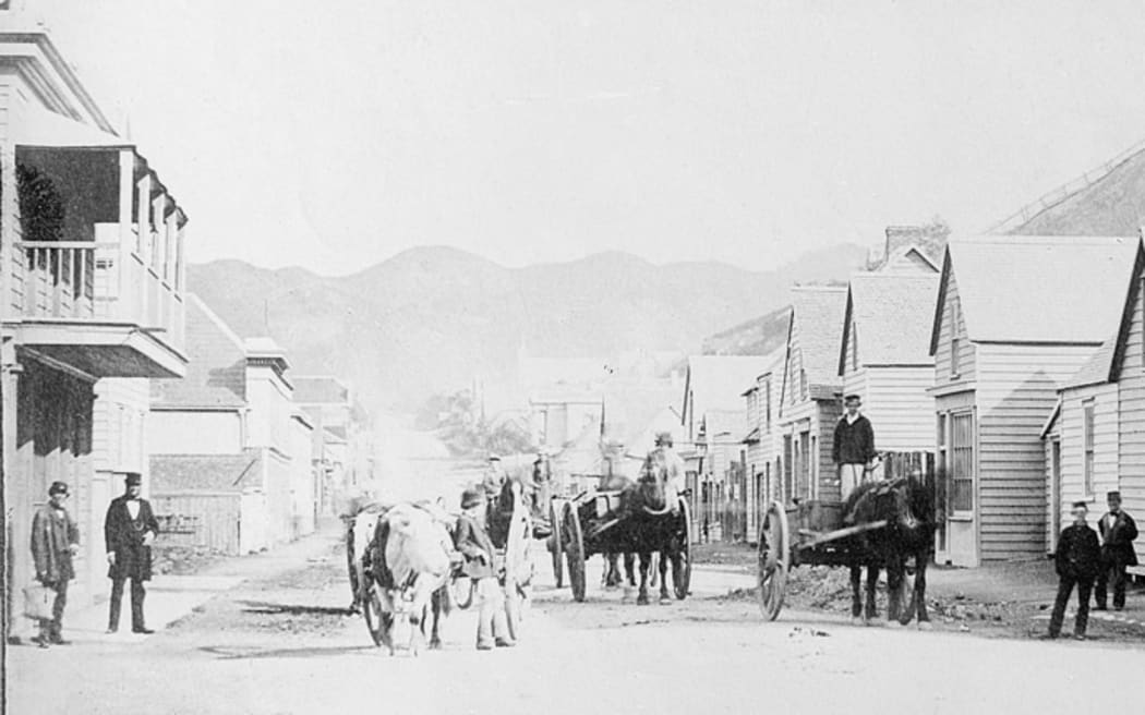 Mr James Osgood, second from left, outside The Empire Hotel, Willis St, Wellington, 1861
- National Library of NZ Ref: 1/1-017882-G.
