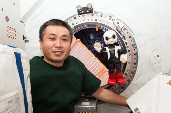 Astronaut Koichi Wakata and Kirobo aboard the International Space Station.