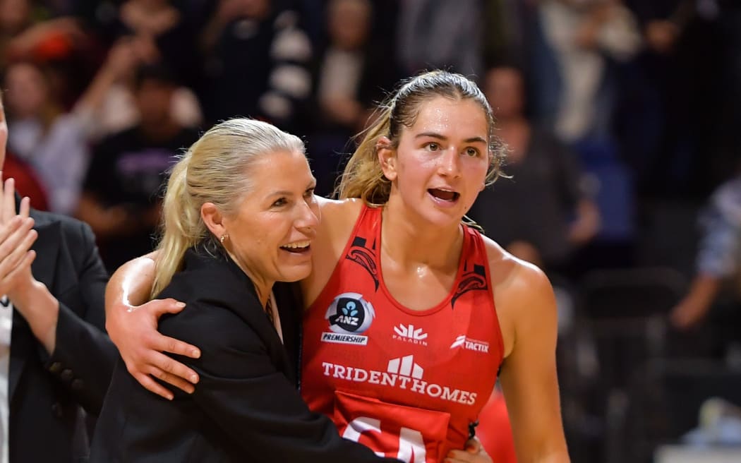 Marianne Delaney-Hoshek Coach of the Tactix and Jess Allan of the Tactix celebrate