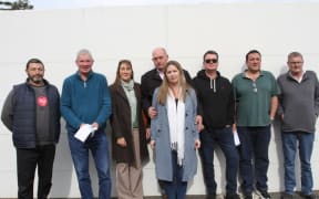 From left: Dean Brunell from Chelsea Park Motor Lodge, Phil Neal from Greens Motel, Hospitality New Zealand regional manager Kim Odendaal, Rick and Stacie Warren from Century Park Motor Lodge; Andy Millener from Arcadia Motel, Shaun Jones from Tudor Lodge; and David Hale from Arrow Motel are angry with their significant commercial rates increases.