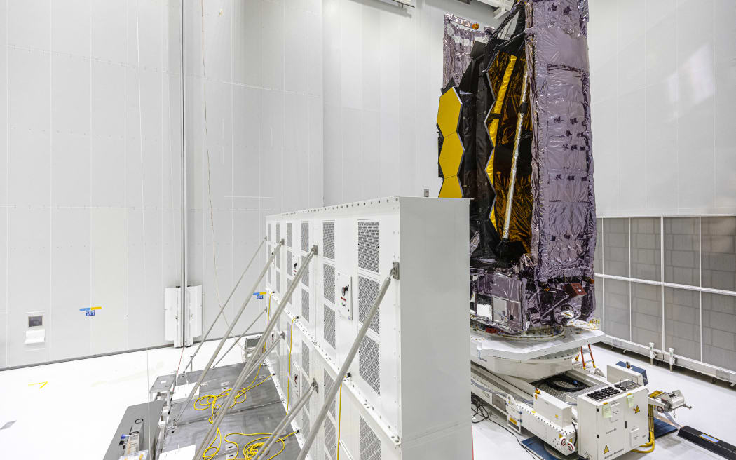 The James Webb Space Telescope stands in the S5 Payload Preparation Facility (EPCU-S5) at The Guiana Space Centre, Kourou, French Guiana at the end of last year.