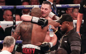 Joseph Parker congratulates Dillian Whyte on winning their heavyweight bout in London.