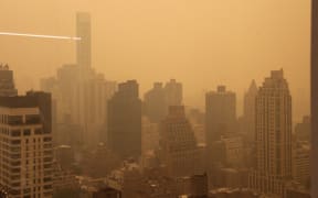 Smoke from the Canada wildfires blanketing New York City.
