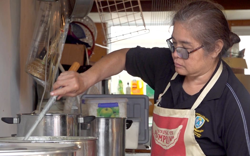 Neela Neela cooking free meals for people doing Cyclone Gabrielle recovery work in Hawkes Bay