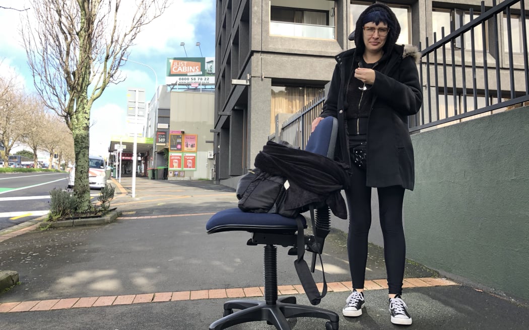 Gemma Harton taking her office supplies home.