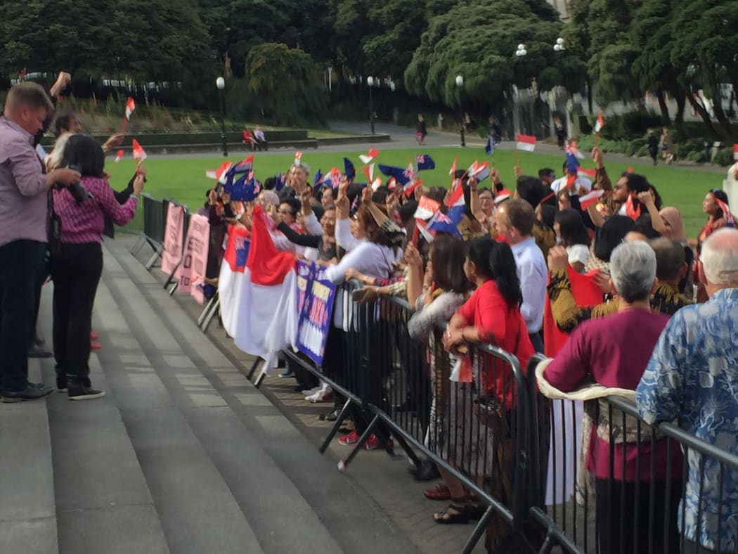 A sing-off on the steps of the New Zealand parliament between protestors and Indonesians during president Joko Widodo's visit to Wellington. 19 March 2018