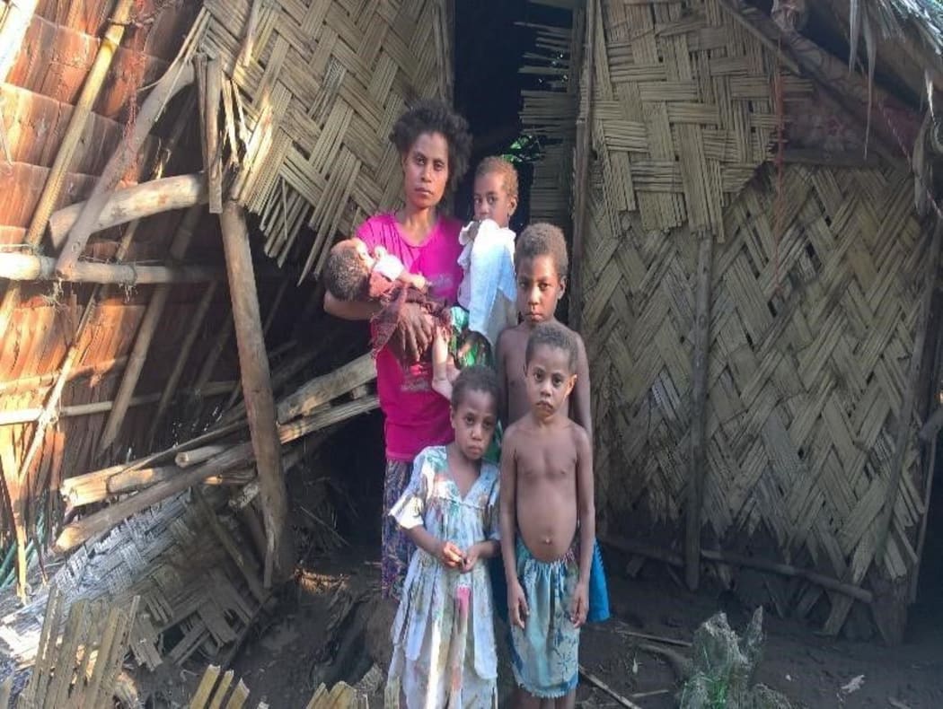 A mother of five who managed to save the lives of all her children on the night of the flooding and landslides.