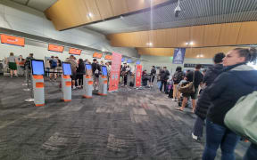 Queues at Wellington Airport after flights were cancelled due to high winds on 31 December 2023.