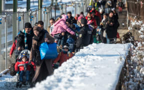 Refugees arrive in Germany in January 2016.