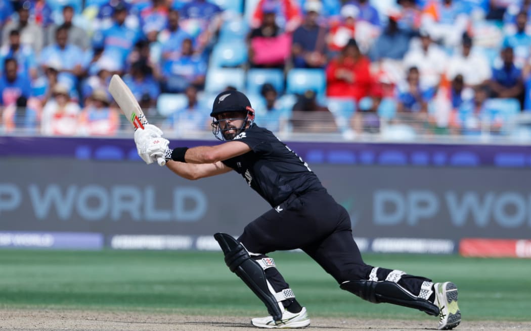 Daryl Mitchell of New Zealand plays a shot.