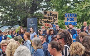 Teachers striking over pay and conditions march in Dunedin, 16 March 2023.