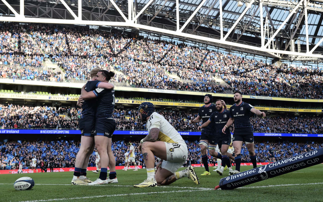 James Lowe celebrates scoring his team's fifth try during the Investec Champions Cup Quarter Final match between Leinster Rugby and Stade Rochelais at Aviva Stadium.