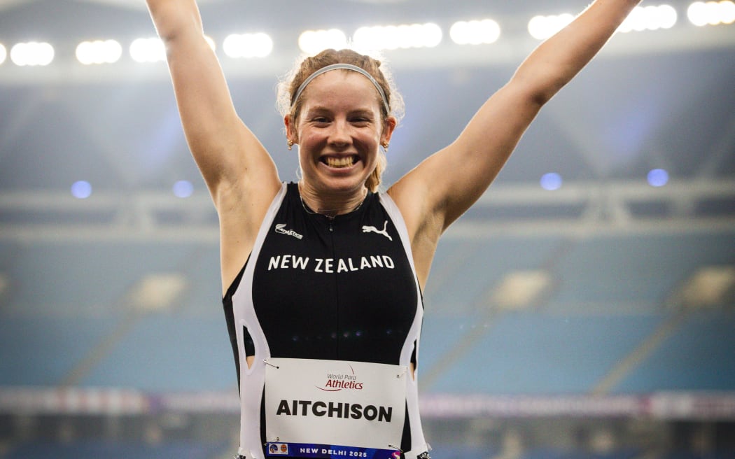 Danielle Aitchison celebrates winning gold for New Zealand in the 100m T36 final at the 2025 World Para Athletics Championships in New Delhi.