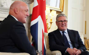 Britain's Prime Minister Keir Starmer (R) and New Zealand Prime Minister Christopher Luxon (L) speaks during their bilateral meeting inside 10 Downing Street in central London, on April 22, 2025. (Photo by Frank Augstein / POOL / AFP)