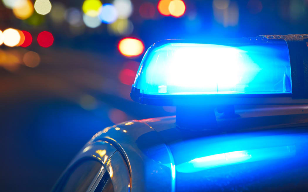 Police car on the street at night