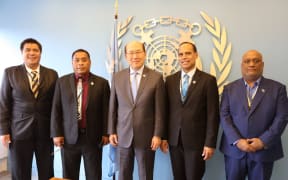 Left to right: Tuvalu's Minister for Transport, Energy and Tourism, Nielu Mesake, Kiribati Minister for Information, Communications and Transport, Tekeeua Tarati, IMO Secretary-General, Kitack Lim, Vanuatu's Climate Change and Environment Minister, Ralph Regenvanu, and Marshall Islands Special Envoy at IMO, Albon Ishoda at the IMO Headquarters in London. July 2023.