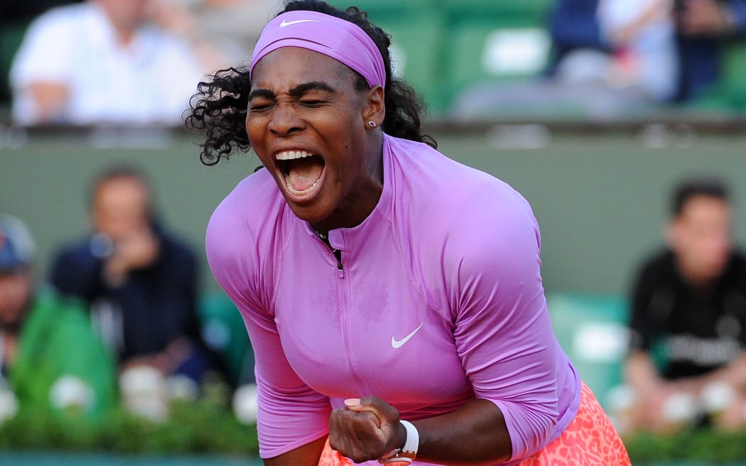 Top seed Serena Williams celebrates after winning her match at the 2015 French Open.