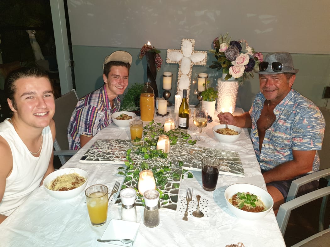 Annette Janes' and family during a themed dinner.