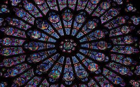 Detail of the north transept rose window in Notre Dame de Paris.