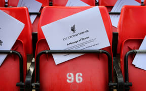 A white card forms part of a message of thanks to the Everton fans for their part in the Hillsborough campaign. Liverpool, 2013.