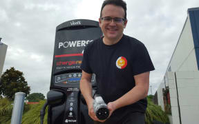 ChargeNet managing director Steve West with the electric charger.