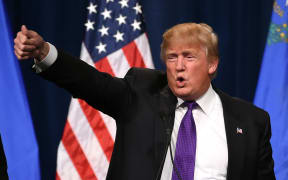 Donald Trump speaks at a caucus night watch party at the Treasure Island Hotel & Casino in Las Vegas, Nevada.