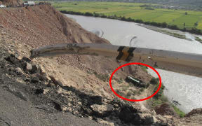 A bus is seen at the end of a ravine after veering off a mountain road and plunged into a ravine on the Panamerican road in southern Peru.