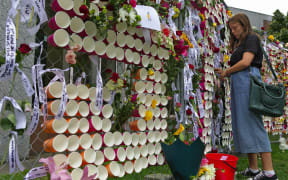 A student at a Christchurch tribute to the victims of the twin terror attacks targeting Al Noor and Linwood mosques.