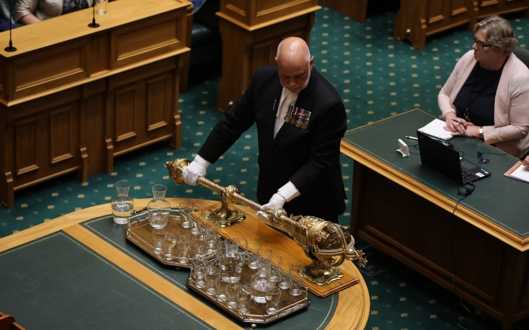 The Serjeant at Arms Places the Mace for the new Speaker Trevor Mallard