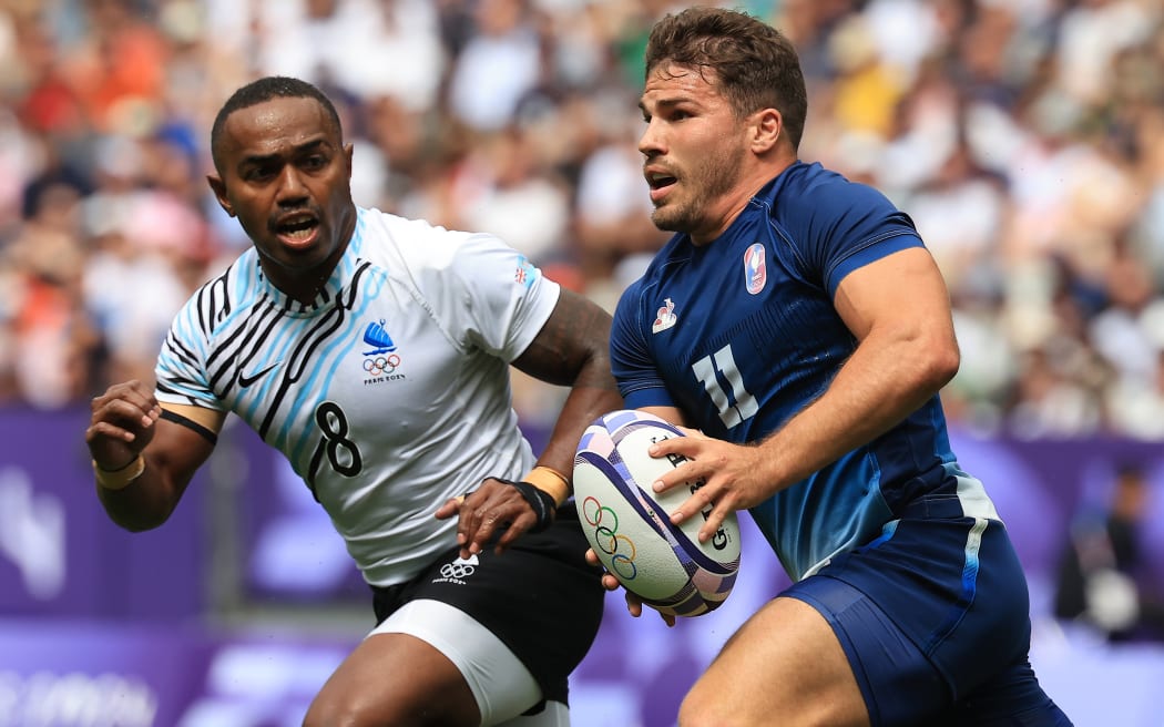 Antoine Dupont in action for France against Fiji during the Paris Olympics men's sevens final.