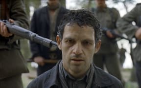 Géza Röhrig as Saul Ausländer in László Nemes’ Academy Award-winning Son of Saul.