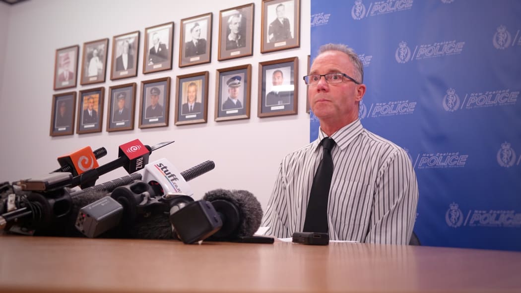Detective Senior Sergeant Roger Small speaking to media.