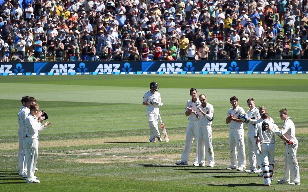 Retiring NZ Captain Brendon McCullum comes to the wicket with a guard of honour.