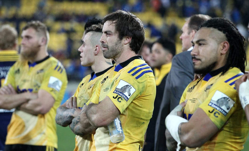 Dejected Hurricanes players Ma'a Nonu, Conrad Smith & TJ Perenara after their loss to the Highlanders in the Super Rugby Final.