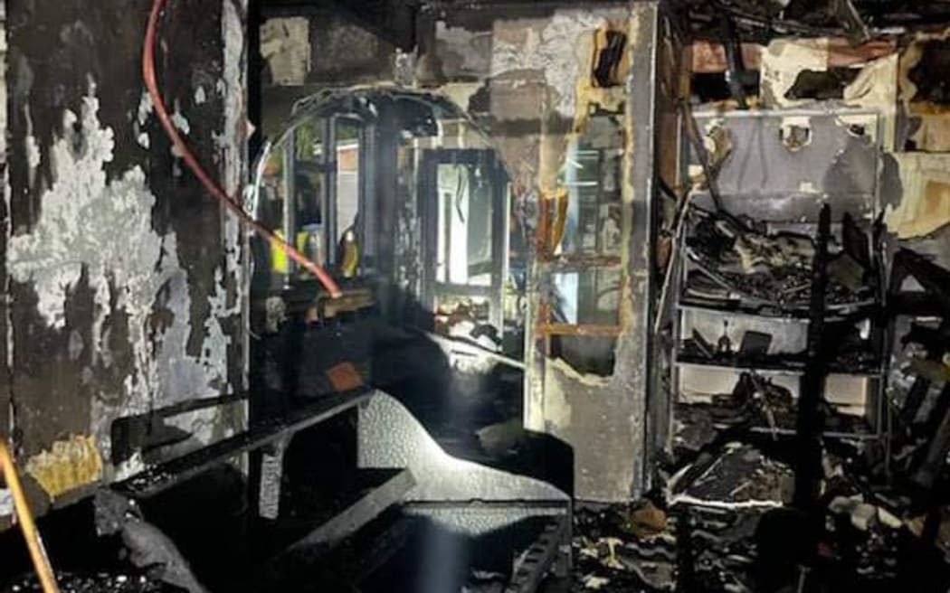 The burnt-out Ōrākei house that the man was rescued from.