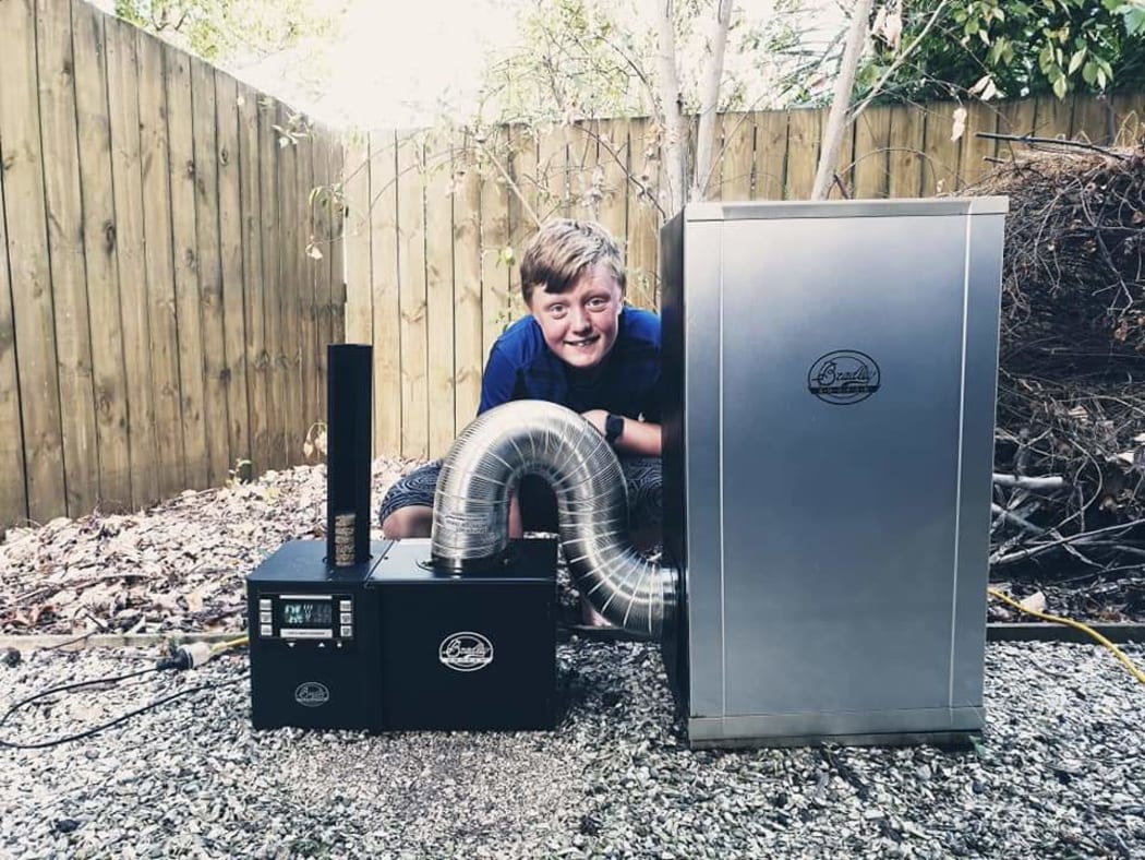 Charlie Pronk with his smoker for butter.
