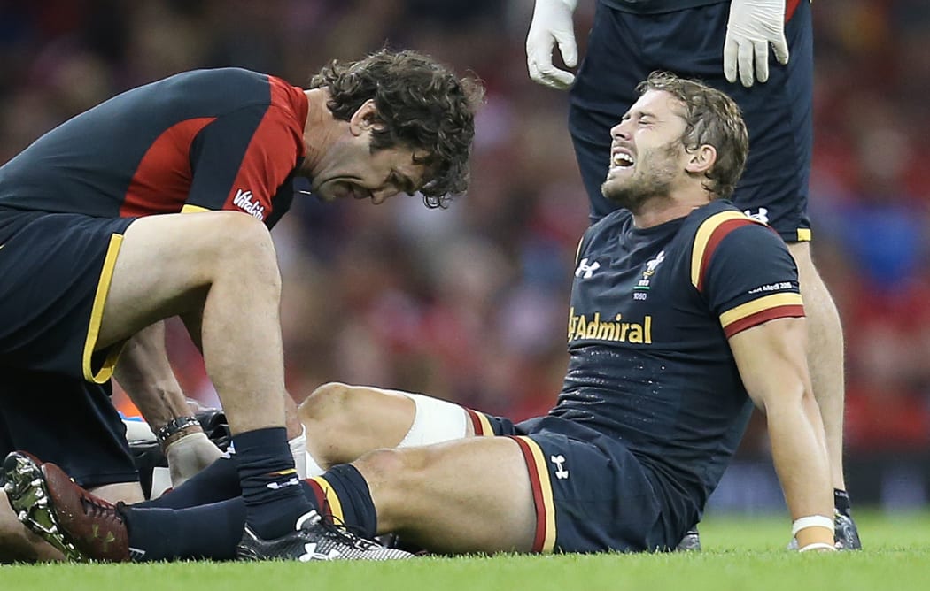 Wales fullback Leigh Halfpenny being treated for injury 2015.