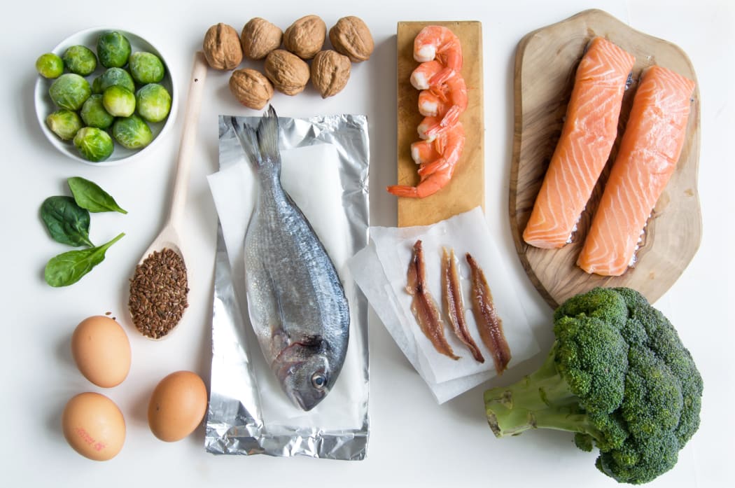 Collection of foods high in fatty acids omega 3 including seafood, vegetables and seeds