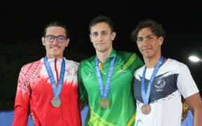 400m freestyle finalists from left Tahiti's Baptiste Savignac (silver) Cook Islands Robert Wesley (gold) New Caledonia's Dabin John Williams.