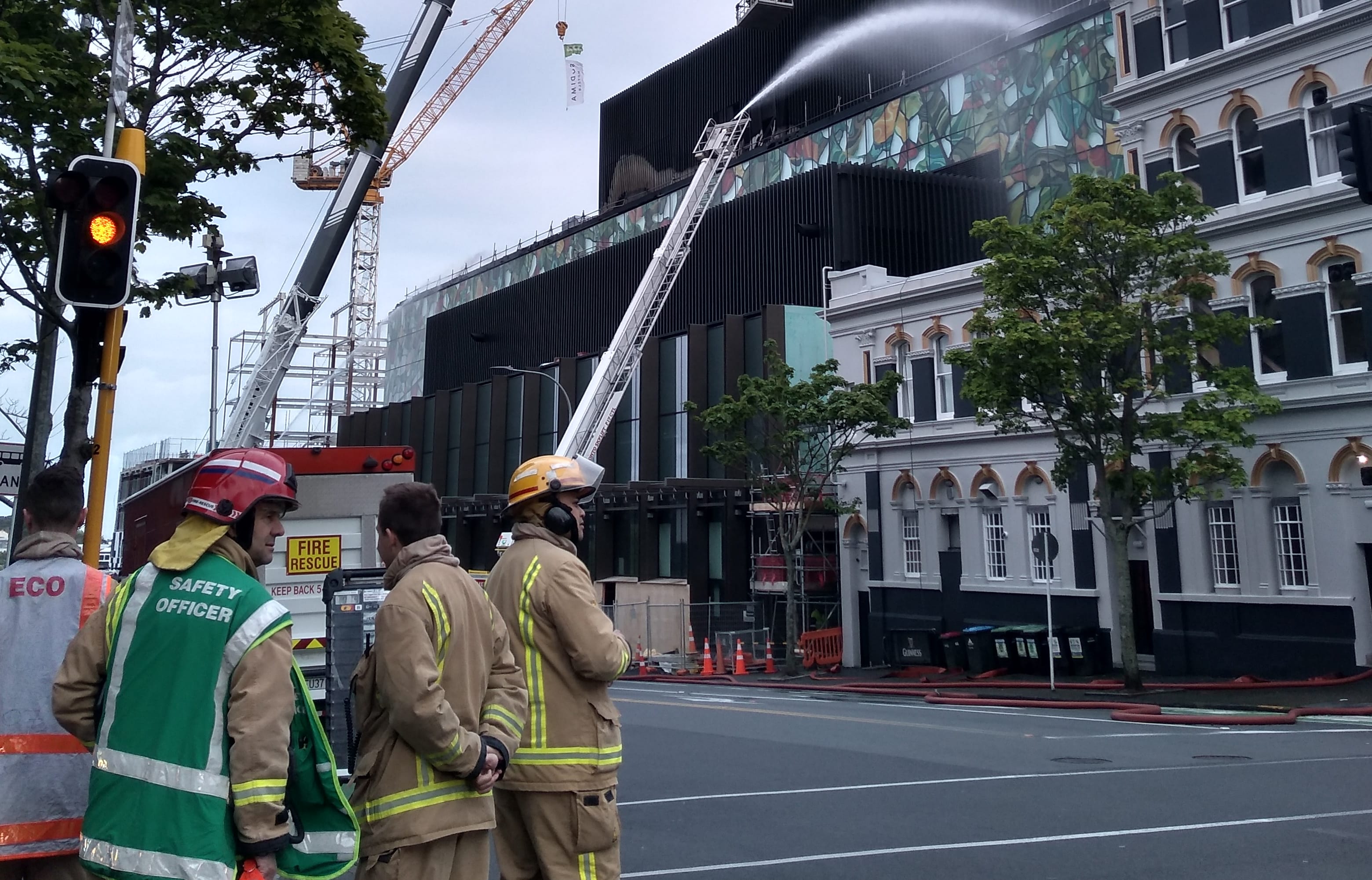 A crane has been brought in to help put out the fire.