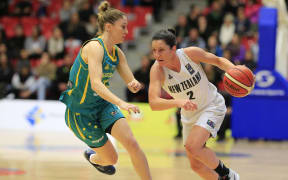 New Zealand women's basketball player Micaela Cocks takes on Australia.
