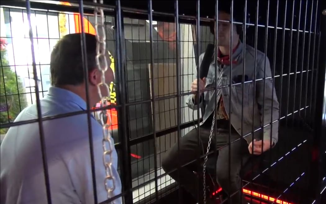John Key agreed to be interviewed in a cage on The Rock.