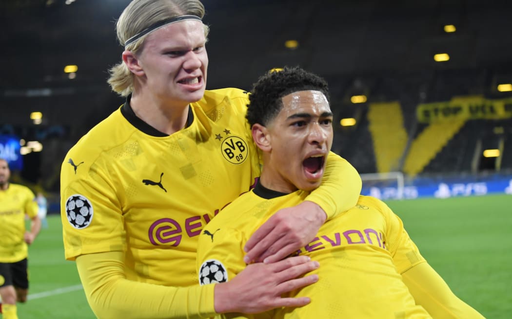 Jude Bellingham of Borussia Dortmund celebrates his goal with Erling Haaland.