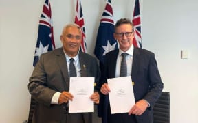 Minister for Foreign Affairs and Immigration Tingika Elikana was in Sydney this week to sign the agreement with Australia’s assistant minister Financial Services Stephen Jones. SUPPLIED / Australian High Commission, Cook Islands / 24111412