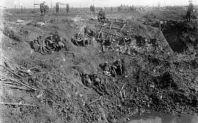 New Zealand engineers resting in a large shell crater at Spree Farm following the First Battle of Passchendaele, 12 October 1917