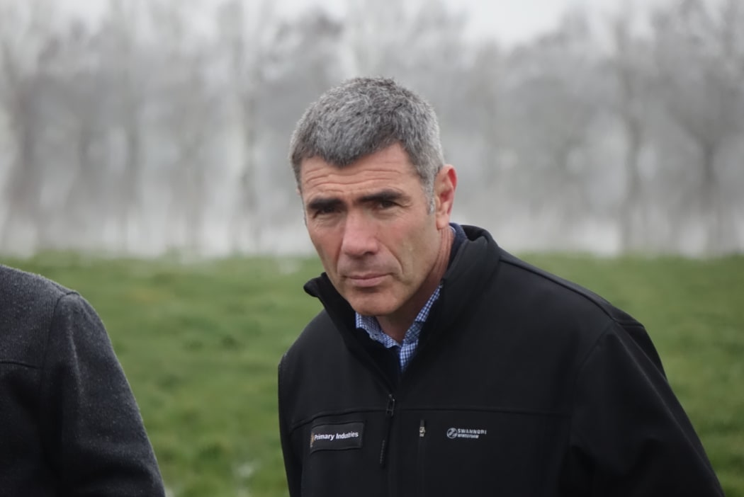 Minister for Primary Industries Nathan Guy on a farm visit as he announced support for flood-hit Otago farmers.