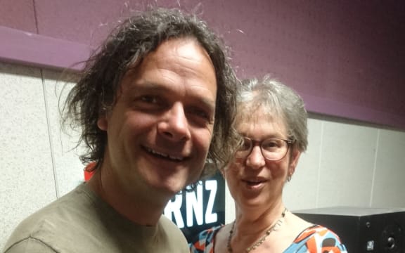 Pianist Jonathan Crayford and Upbeat presenter Eva Radich in their matching orange pants.