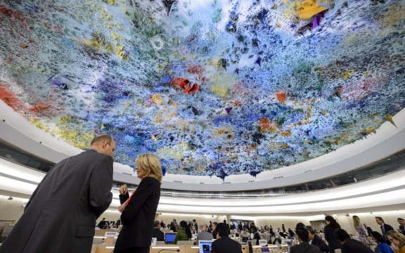 Delegates speaks prior to the opening of a session of the Human Rights Council on the Palestinian territories situation on March 23, 2015 in Geneva.