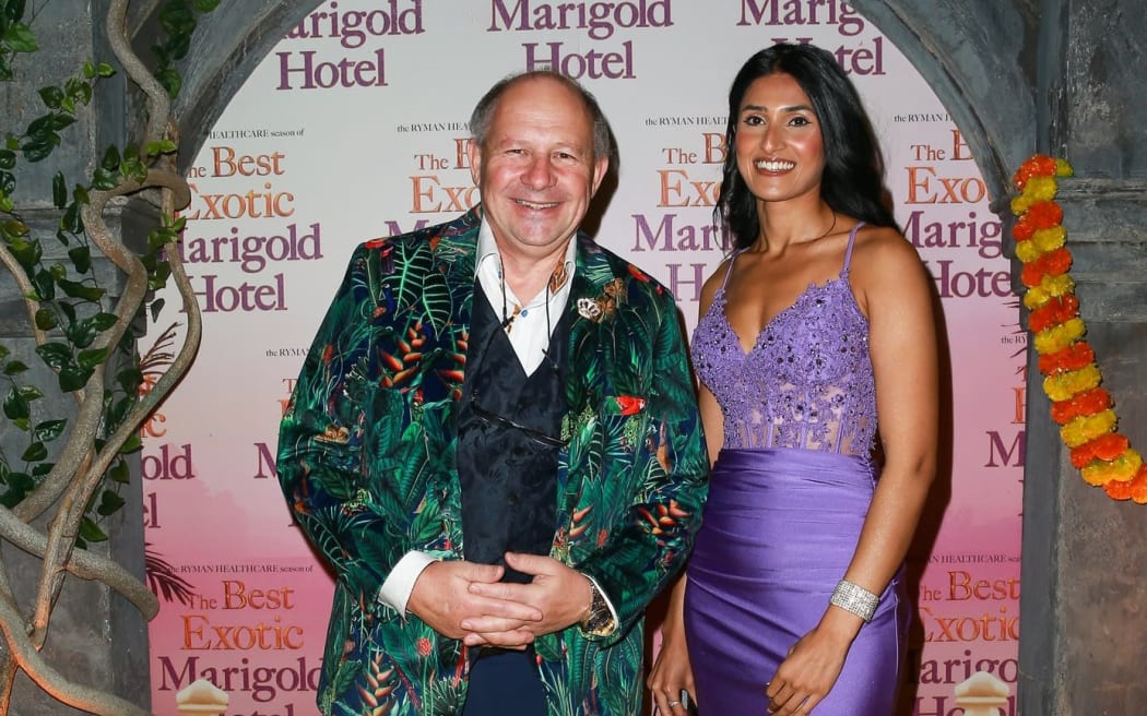 Miss World New Zealand licence holder Nigel Godfrey with pageant winner Navjot Kaur at a theatre premier in April 2024.